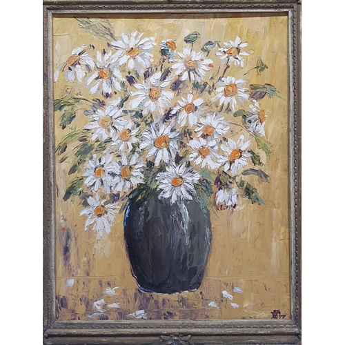 116 - A framed still life oil on canvas depicting daises in vase with monogram to bottom corner dated 77 a... 