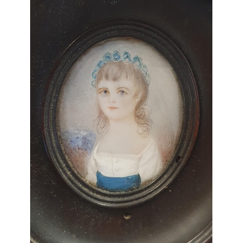 70 - A small 19th century hand painted miniature portrait in oval oak frame overall dimensions 9x7cm