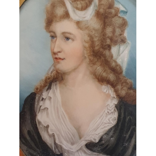 71 - A large framed hand painted miniature portrait of a young lady circa 1830 overall dimensions 15x11cm