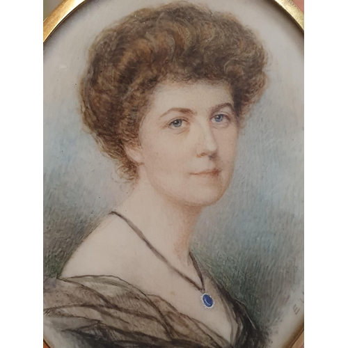 75 - A hand painted miniature portrait of a Victorian lady signed E Lloyd overall dimensions 9x7.5cm