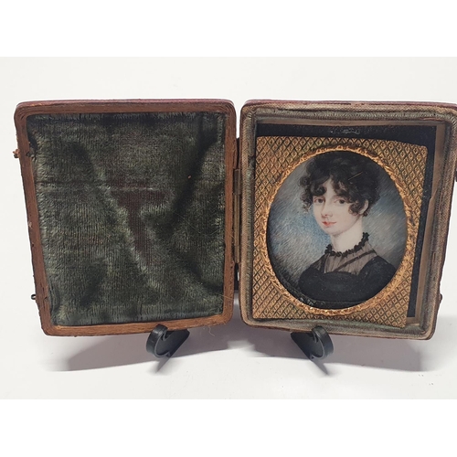 77 - A Georgian hand painted miniature portrait of a young lady in a fitted case overall dimensions 8x6.5... 