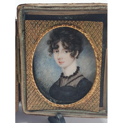 77 - A Georgian hand painted miniature portrait of a young lady in a fitted case overall dimensions 8x6.5... 