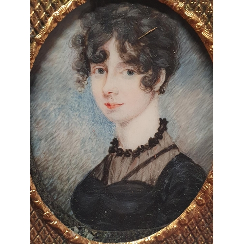 77 - A Georgian hand painted miniature portrait of a young lady in a fitted case overall dimensions 8x6.5... 