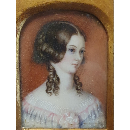 78 - A 19th century framed miniature portrait of a young lady overall dimensions 11x9cm