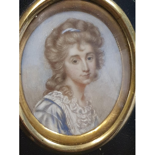 82 - The circle of Frederick Buck (1781-1840) framed miniature portrait of a lady in an ebonised frame ov... 