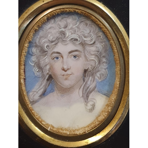 84 - The circle of Frederick Buck (1781-1840) framed miniature portrait of a lady in an ebonised frame ov... 