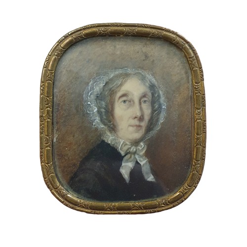 74 - A Victorian brass framed hand painted miniature portrait of a older lady overall dimensions  8x6.5cm