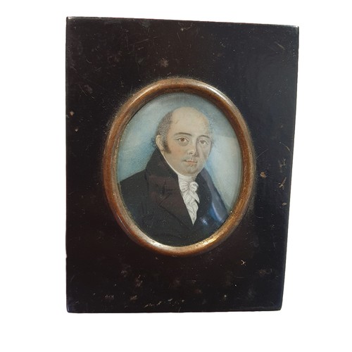 85 - The circle of Frederick Buck (1781-1840) framed miniature portrait of a gentleman in an ebonised fra... 