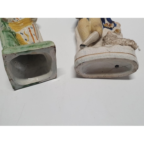 187 - Two early 18th century Staffordshire flatback figurines