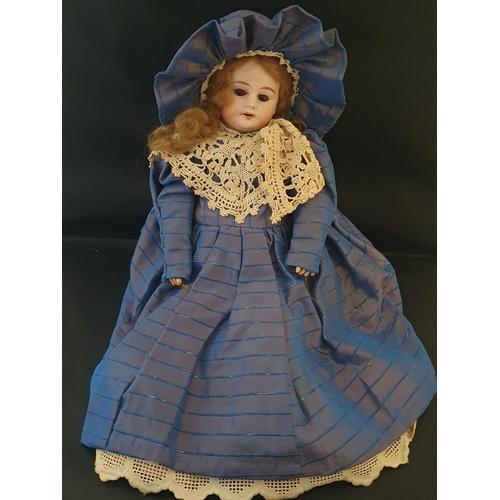 191 - Two Heubach bisque dolls with period dress and one other with horseshoe mark to back of the neck pos... 