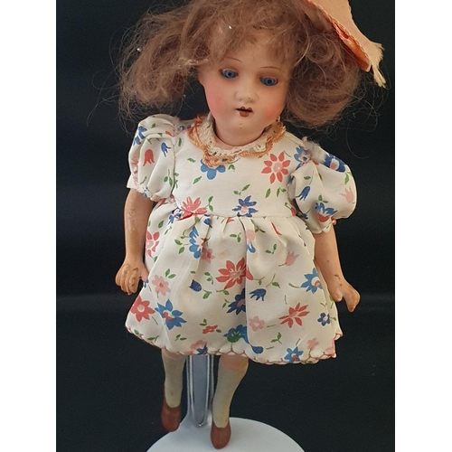 191 - Two Heubach bisque dolls with period dress and one other with horseshoe mark to back of the neck pos... 