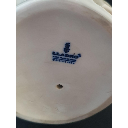 193 - A large Lladro figurine h33cm with a Nao Goose