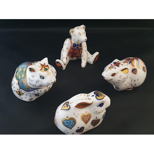 195 - Four assorted Royal Crown Derby paperweights three with gold stopper, teddy missing stopper