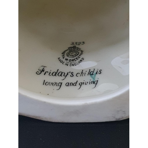 209 - A Royal Worcester figurine 'Friday's Child is Loving and Giving'
