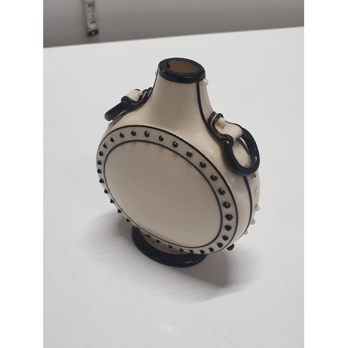 210 - A possibly early Royal Worcester moon shaped vase or 