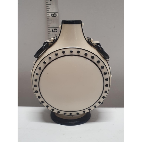 210 - A possibly early Royal Worcester moon shaped vase or 