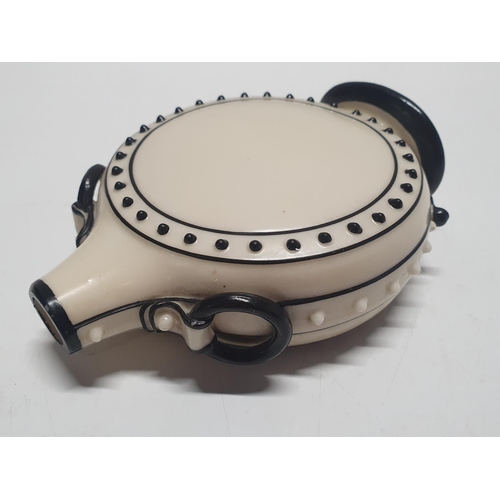 210 - A possibly early Royal Worcester moon shaped vase or 