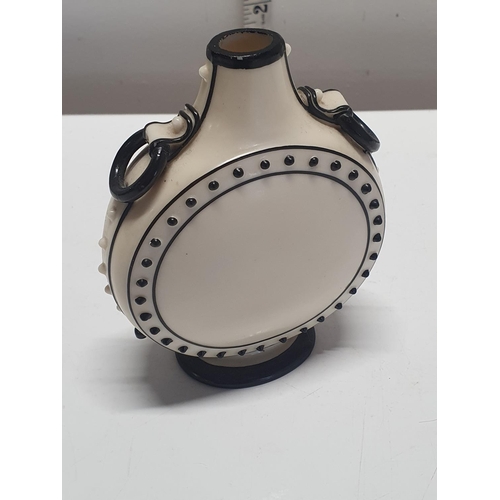 210 - A possibly early Royal Worcester moon shaped vase or 