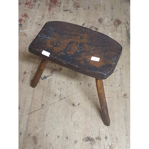 218 - A antique oak three legged stool h41cm, shipping unavailable