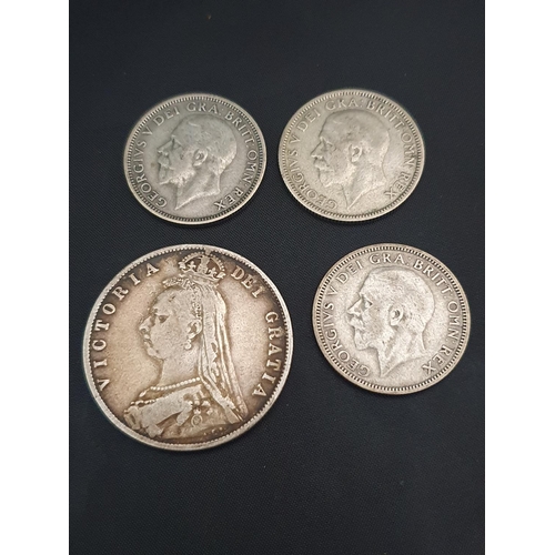 218 - A Victorian half crown coin for 1892 and British coins dated 1929, and two dated 1936.