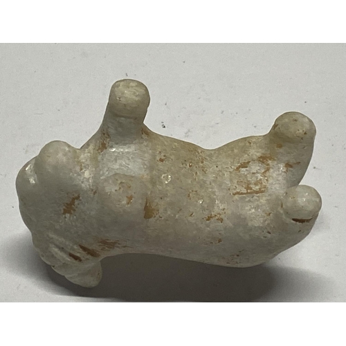 201 - A Greek 2500 year old carved marble figure of a goat, wear to the horns and one leg missing.