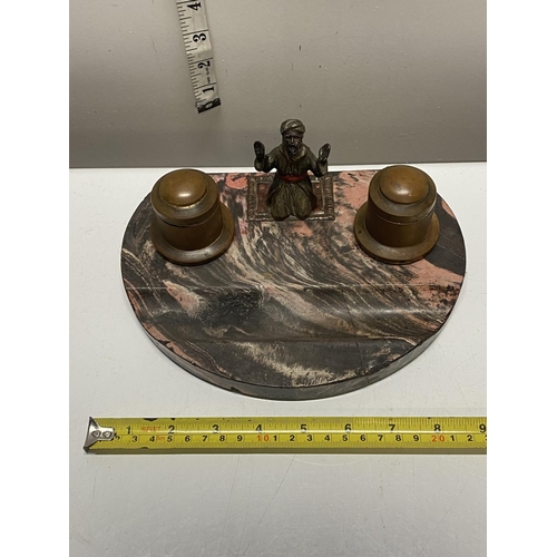 198 - A antique marble based ink well/desk set with a cold painted bronze kneeling figure. crack to the ba... 