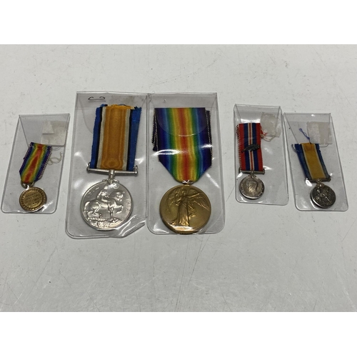 206 - A set of WW1 medals and miniature awarded to L-36058 BMBR C. Charlton R.A