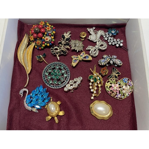 118 - A box full of assorted costume jewellery brooches etc