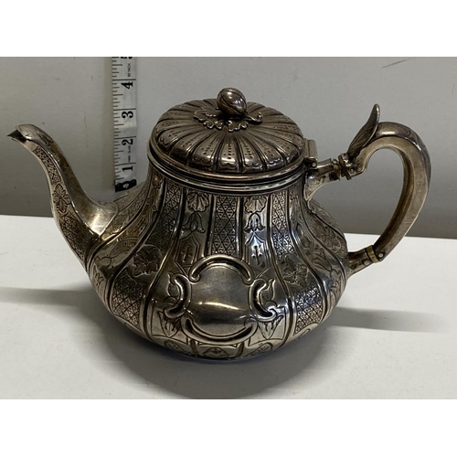 136 - A hallmarked for Dublin 1852 silver teapot 700grams in total weight. (slight damage to handle)