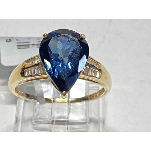 148 - A 9ct gold London Blue Topaz and Diamond ring 3.48g size T 1/2