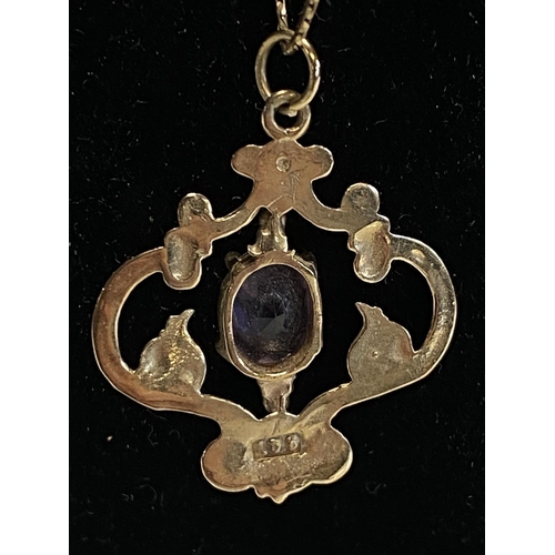 156 - A 9ct gold and amethyst pendant on a 9ct gold chain 3.83g