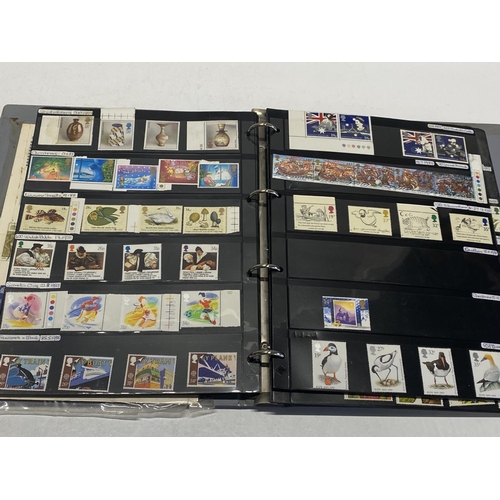 300 - A stamp album with contents of British  stock stamps