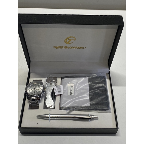 502 - A men's Chtime gift set including watch, pen knife and pen etc