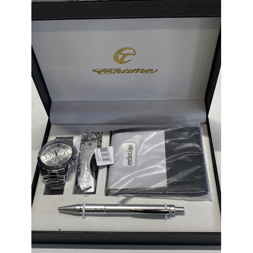 504 - A men's Chtime gift set including watch, pen knife and pen etc