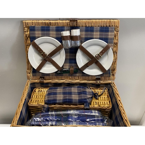 600 - A boxed as new picnic basket with contents, shipping unavailable