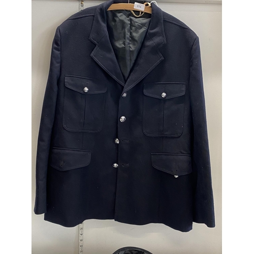 614 - A HM Prison jacket plus a ladies police hat