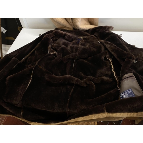 618 - A suede Duffle coat with a Burberrys Lable (unauthenticated) very good quality.