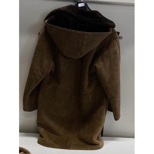 618 - A suede Duffle coat with a Burberrys Lable (unauthenticated) very good quality.