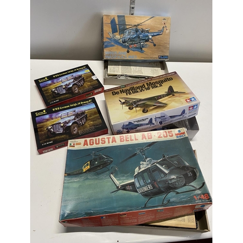 Five assorted model kits