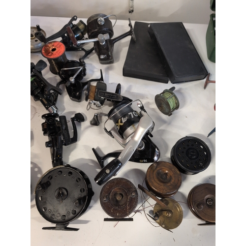 A Collection of Assorted Fishing Reels, including Spinning, Baitcasting ...