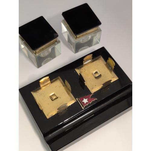 93 - A 1930s White Star Line Art Deco Black Desk Set with Two Inkwells