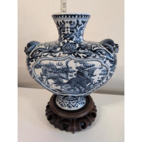 96 - A Chinese Blue and White Porcelain Vase, Bearing a Qianlong Mark, with Three Animal-Head Handles and... 