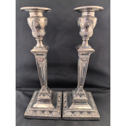 101 - A Pair of Loaded Sterling Silver Candlesticks Attributed to Hukin & Heath Sheffield 1907, Gross Weig... 