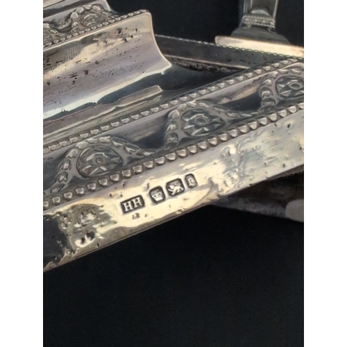 101 - A Pair of Loaded Sterling Silver Candlesticks Attributed to Hukin & Heath Sheffield 1907, Gross Weig... 