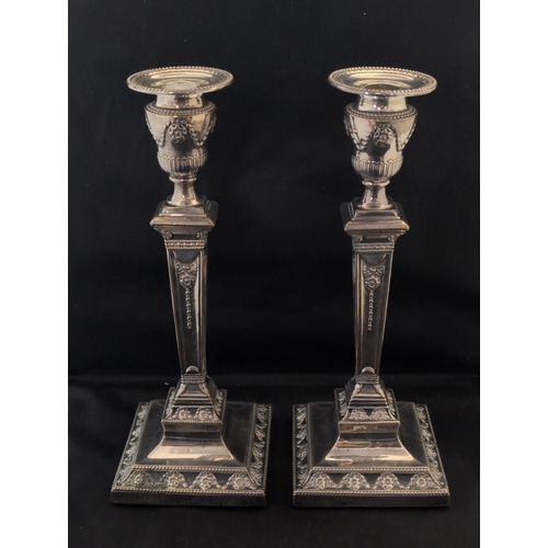 101 - A Pair of Loaded Sterling Silver Candlesticks Attributed to Hukin & Heath Sheffield 1907, Gross Weig... 