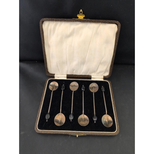 109 - A Cased Set of Six Art Deco Sterling Silver Coffee Bean Spoons