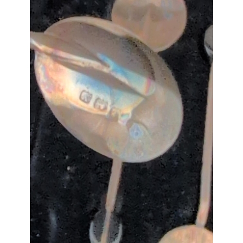 109 - A Cased Set of Six Art Deco Sterling Silver Coffee Bean Spoons