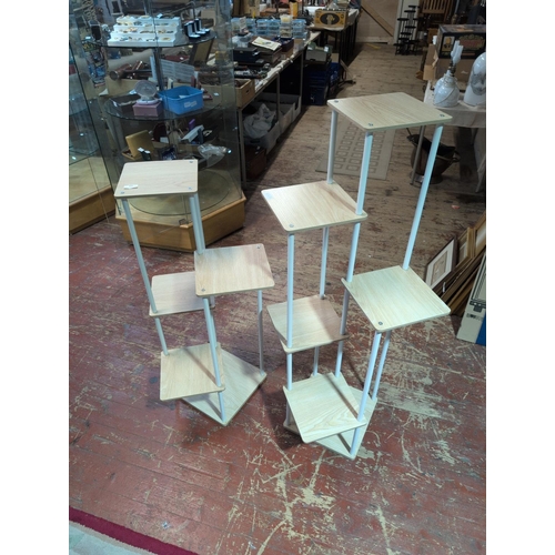 62 - A Pair of Multi-Tiered Plant Stands. Tallest 117cm. Shipping Unavailable