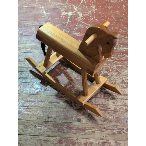 72 - A Modern Rustic Wooden Rocking Horse. Shipping Unavailable