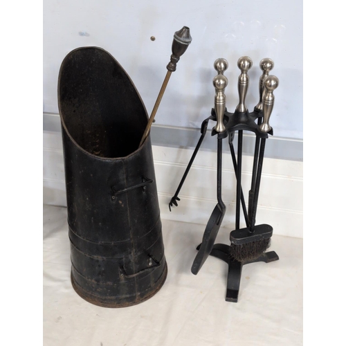 74 - A Black Metal Coal Scuttle and Five-Piece Fireplace Companion Set, shipping unavailable